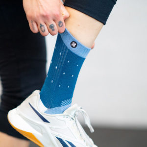 Athlete wearing Crossfeet Performance Socks in Dot Delight